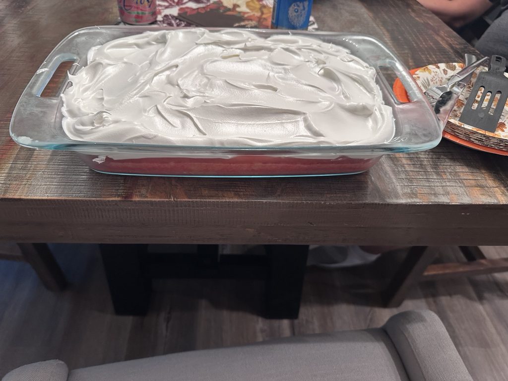 Homemade Jell-O cake with whipped topping